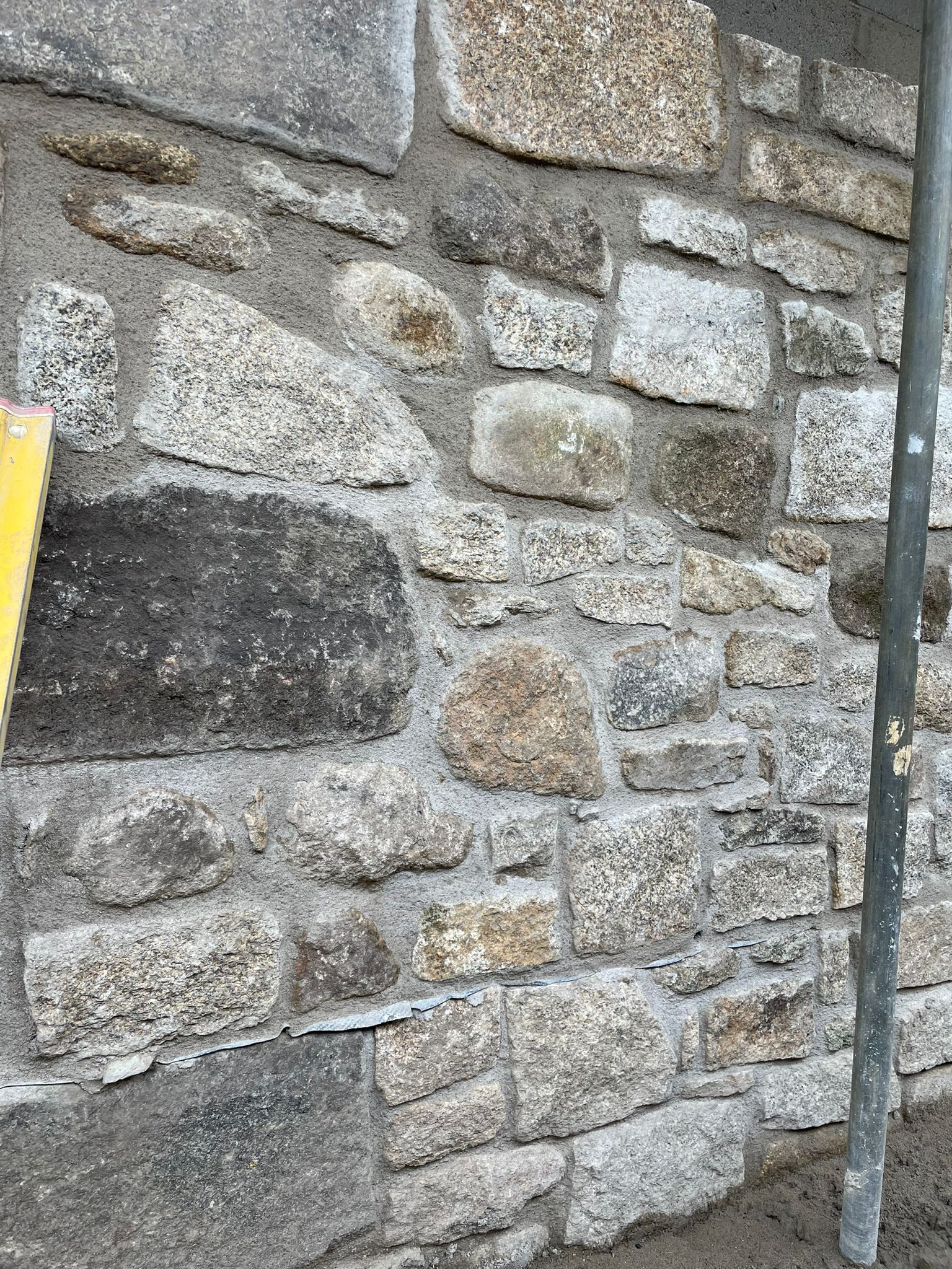 An exterior stone wall at a property in Penzance.