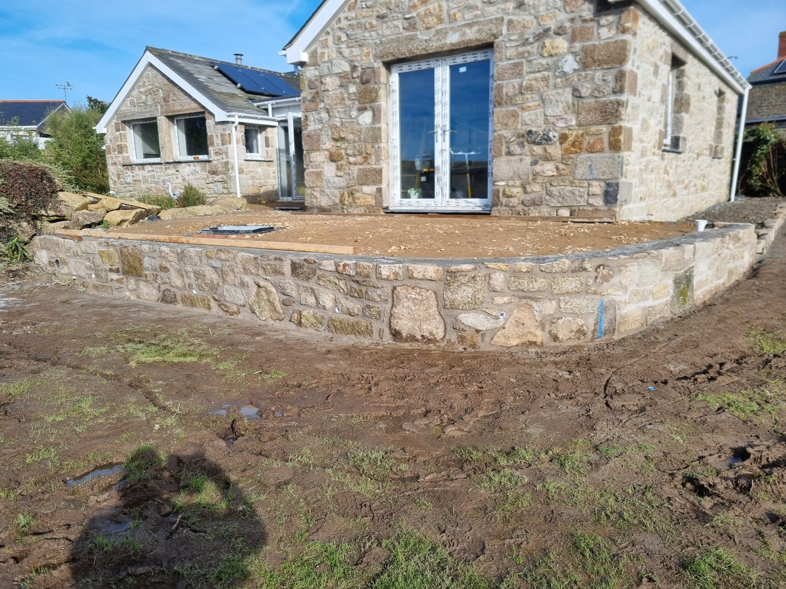 Retaining wall and extension at a property in West Cornwall